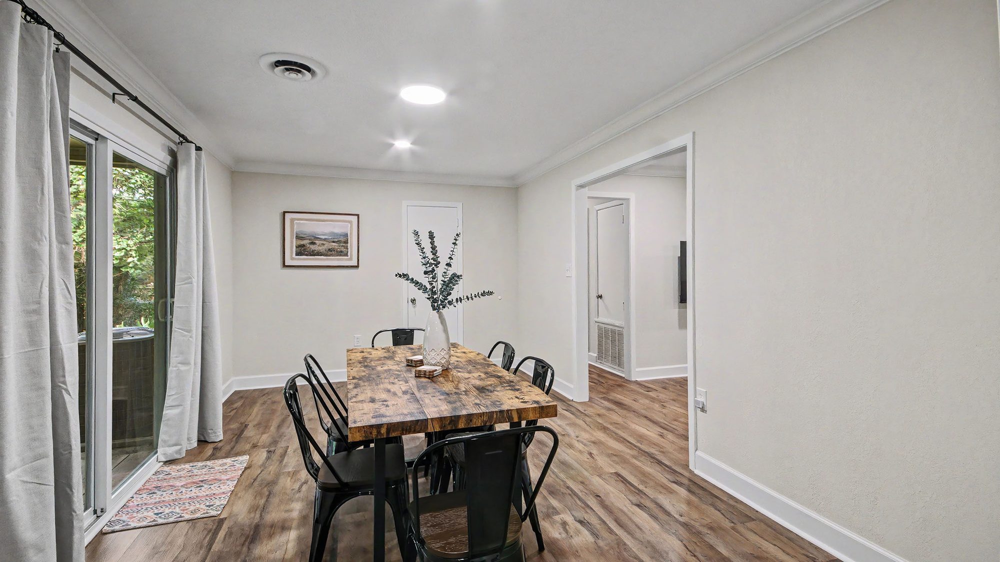 Dining room with view toward the kitchen hallway