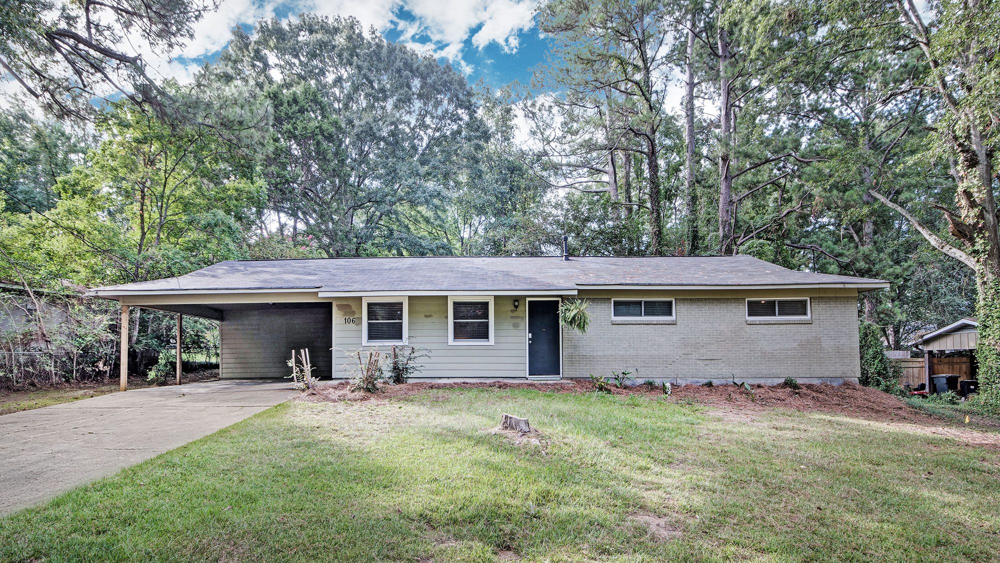Front exterior of the single-family home at 106 Murial St, Clinton, MS