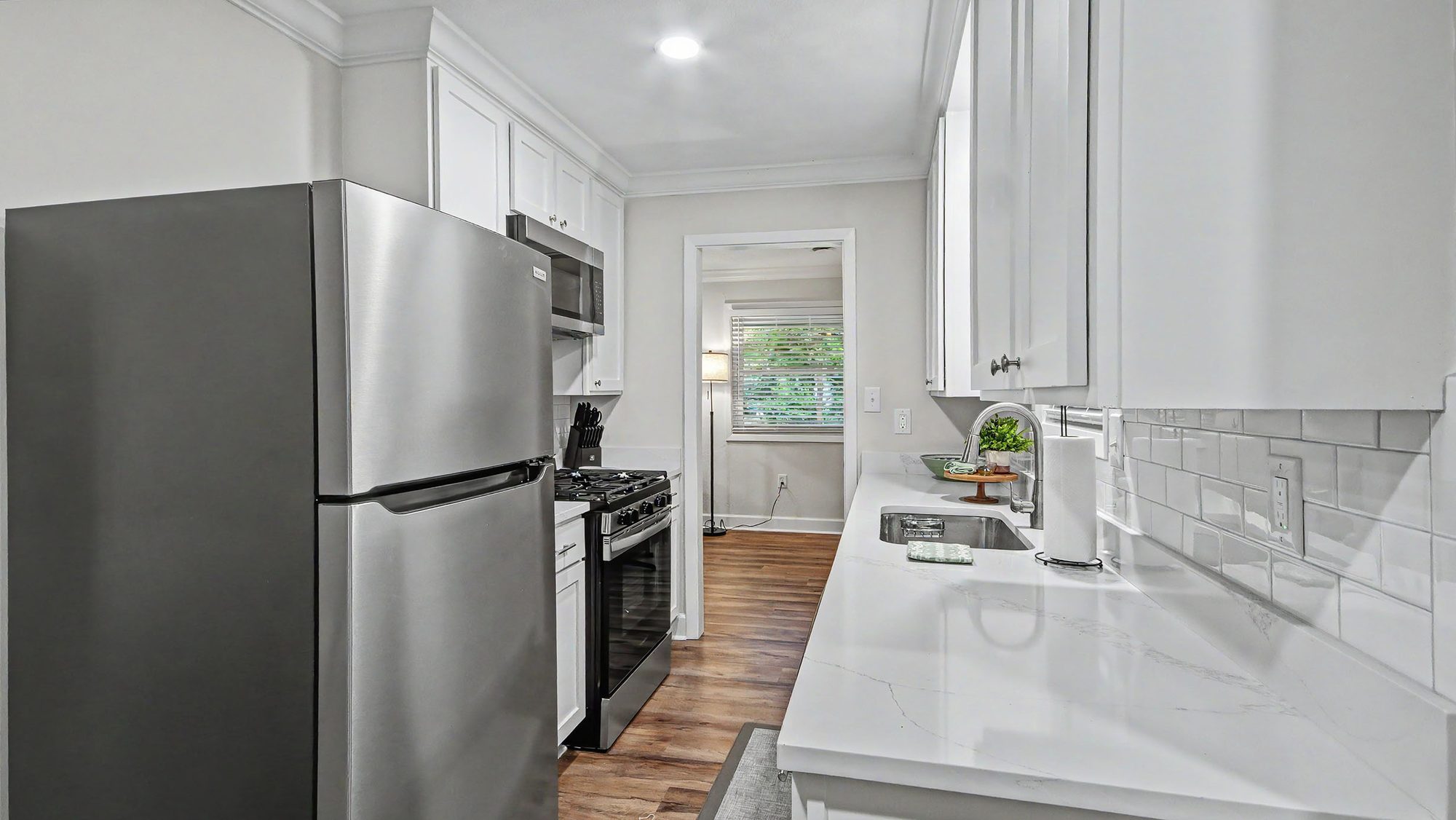 Kitchen gas range and built-in microwave